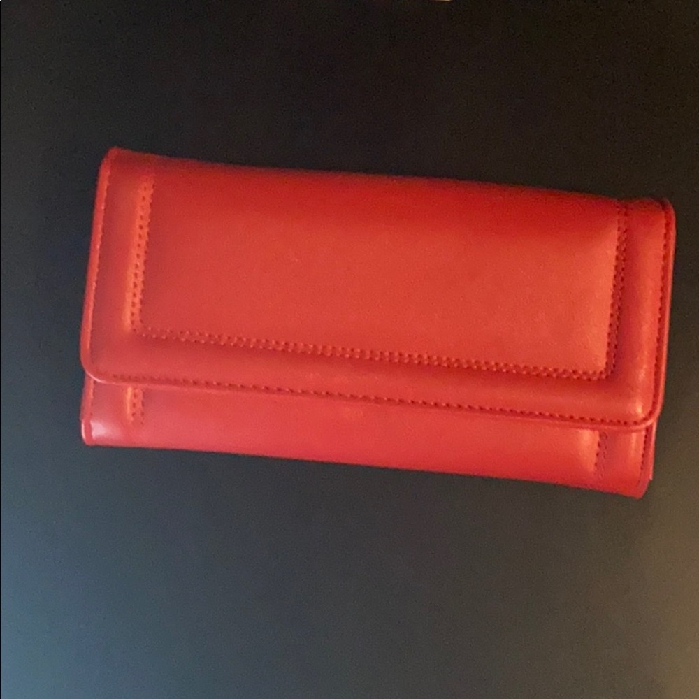 Unused red wallet 8 card slots, 2 zipper pockets.